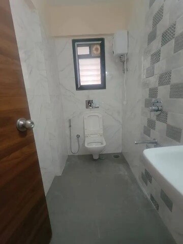 Bathroom in 2 BHK Apartment at Kabra Diamante, Goregaon West – for Rent