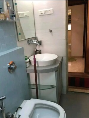 Bathroom in 2 BHK Apartment at Mahindra Gardens, Goregaon West – for Rent