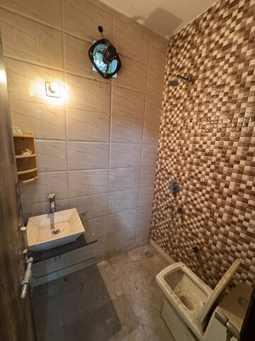 Bathroom in 5 BHK Apartment at Janakpuri – for Sale