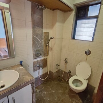 Bathroom in 2 BHK Apartment at Omkar CHS Dadar, Matunga West – for Rent
