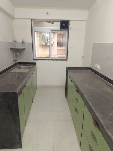 Kitchen in 1 BHK Apartment at Haware Amara, Vikhroli East – for Rent
