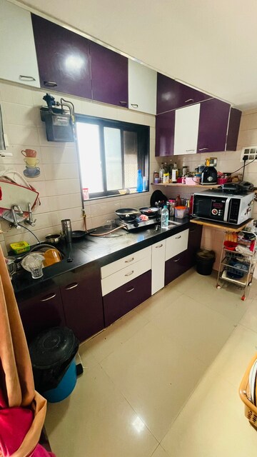 Kitchen in 1 BHK Apartment at Vishal Nagar CHS Malad, Malad West – for Rent