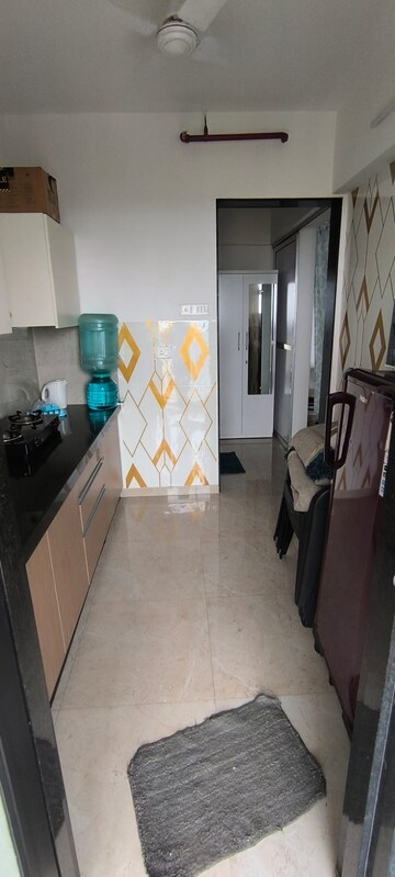 Kitchen in 1 BHK Apartment at Shanti Gardens , Mira Road – for Sale