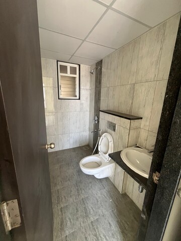Bathroom in 2 BHK Apartment at Kolte Patil R10, Hinjewadi – for Rent