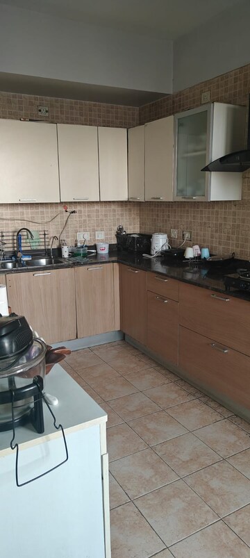 Kitchen in 2 BHK Apartment at Signature Global The Millennia, Sector 37d – for Rent