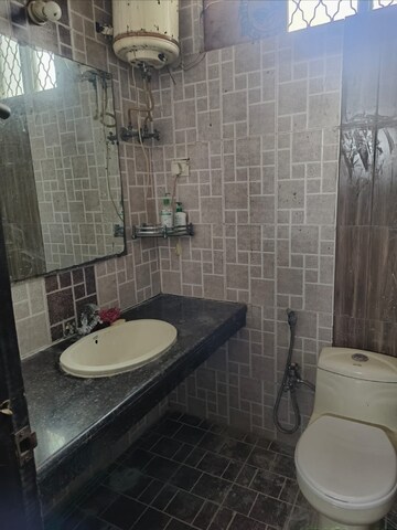 Bathroom in 2.5 BHK Apartment at Boutique Residential Apartments C-220, Malviya Nagar – for Rent