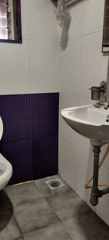Bathroom in 2 BHK Apartment at Agarwal Trinity Towers, Malad West – for Rent