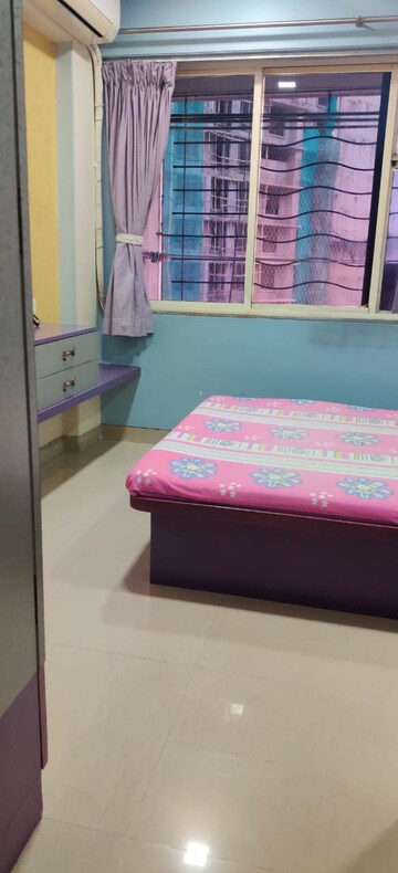 Bedroom in 2 BHK Apartment at Agarwal Trinity Towers, Malad West – for Rent