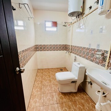 Bathroom in 3 BHK Apartment at Indiranagar – for Rent