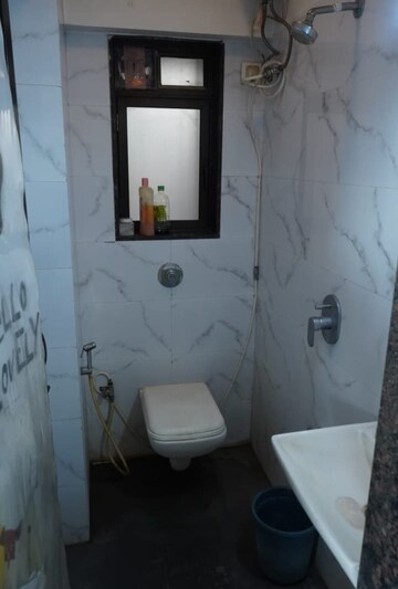 Bathroom in 2 BHK Apartment at Milan Enclave, Jogeshwari East – for Sale