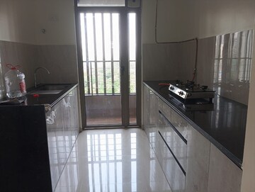 Kitchen in 2 BHK Apartment at Kalpataru Paramount, Kapur Bawdi – for Rent