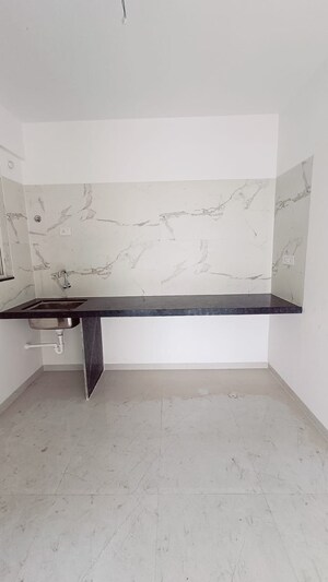 Kitchen in 2 BHK Apartment at ARV Uthville, Kharadi – for Sale