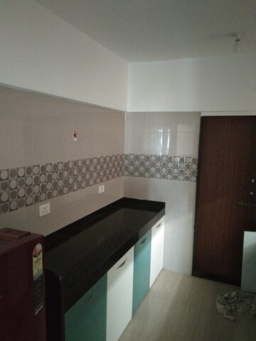 Kitchen in 2 BHK Apartment at Siddhesh Optimus, Viman Nagar – for Rent