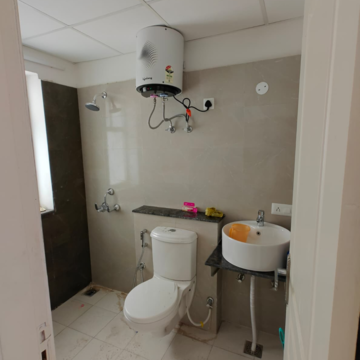 Bathroom in 2 BHK Apartment at International Airport Road – for Rent