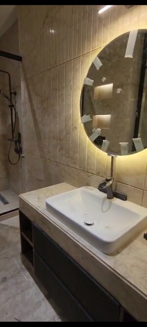 Bathroom in 4 BHK Apartment at Chanakyapuri – for Sale