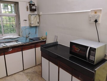 Kitchen in 1 BHK Apartment at Rajiv CHS, Bandra East – for Rent