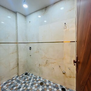 Bathroom in 4 BHK Builder Floor at Hargobind Enclave – for Sale