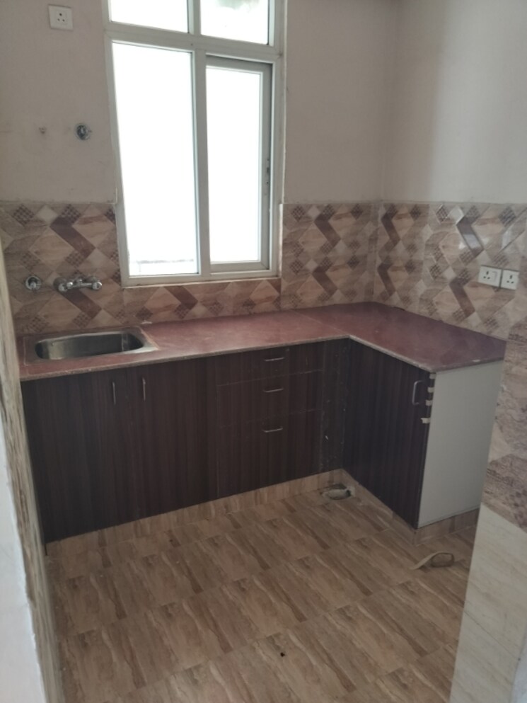 Kitchen, amrapali-golf-homes 2 Bedroom 835 Sq.Ft. Apartment In Sector 4 Greater Noida Greater Noida 9119515