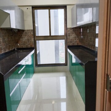 Kitchen in 2 BHK Apartment at Rajesh Raj Infinia, Evershine Nagar – for Rent