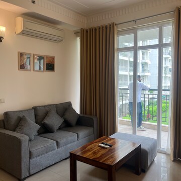 Living Room in 2 BHK Apartment at Central Park Resorts, Islampur – for Rent
