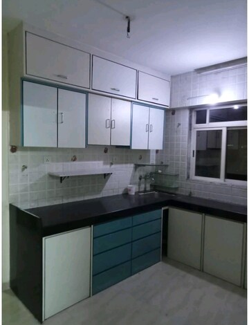 Kitchen in 2 BHK Apartment at Galaxy Tower, Waghbil – for Rent