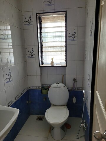 Bathroom in 2 BHK Apartment at Takshila CHS, Andheri East – for Rent