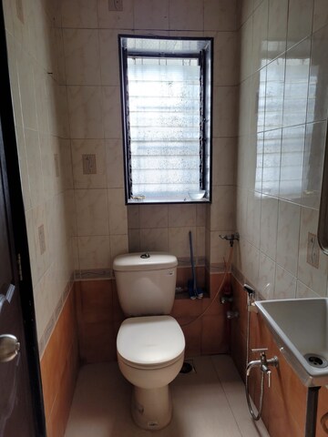 Bathroom in 2 BHK Apartment at Takshila CHS, Andheri East – for Rent