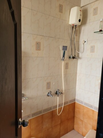 Bathroom in 2 BHK Apartment at Takshila CHS, Andheri East – for Rent