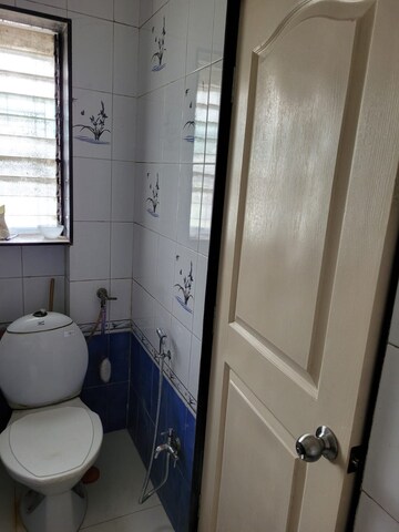 Bathroom in 2 BHK Apartment at Takshila CHS, Andheri East – for Rent