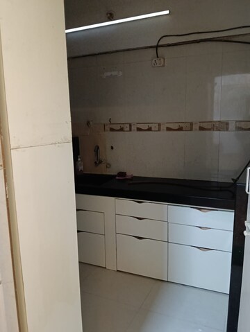 Kitchen in 2 BHK Apartment at Kamlesh Apartment, Andheri East – for Rent