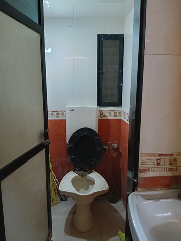 Attached Bathroom in 2 BHK Apartment at Kamlesh Apartment, Andheri East – for Rent