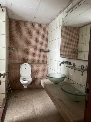 Bathroom in 3 BHK Apartment at Unitech Uniworld Gardens, Sector 47 – for Sale