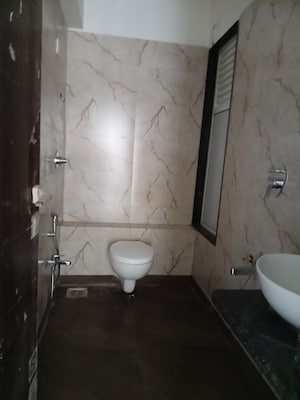 Bathroom in 1 BHK Apartment at Bhagwati Belmont, Haware City – for Sale