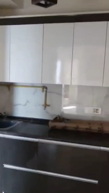 Kitchen in 2.5 BHK Apartment at Mahagun Mywoods, Sector 16c Greater Noida – for Sale