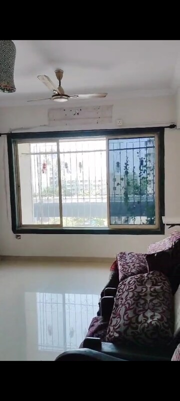 Bedroom in 2 BHK Apartment at Mahakaleshwar Apartment, Dahisar West – for Sale