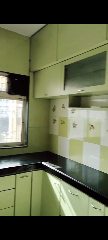 Kitchen in 2 BHK Apartment at Mahakaleshwar Apartment, Dahisar West – for Sale