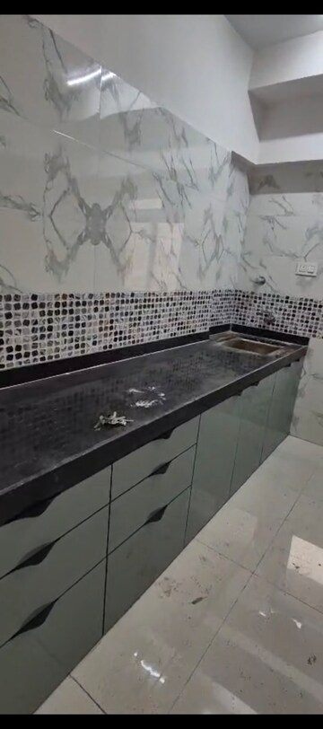 Kitchen in 3 BHK Apartment at DGS Sheetal Tapovan, Malad East – for Rent