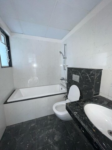 Bathroom in 2.5 BHK Apartment at Gera World of Joy, Kharadi – for Rent