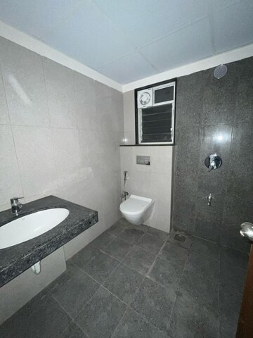 Bathroom in 2.5 BHK Apartment at Gera World of Joy, Kharadi – for Rent