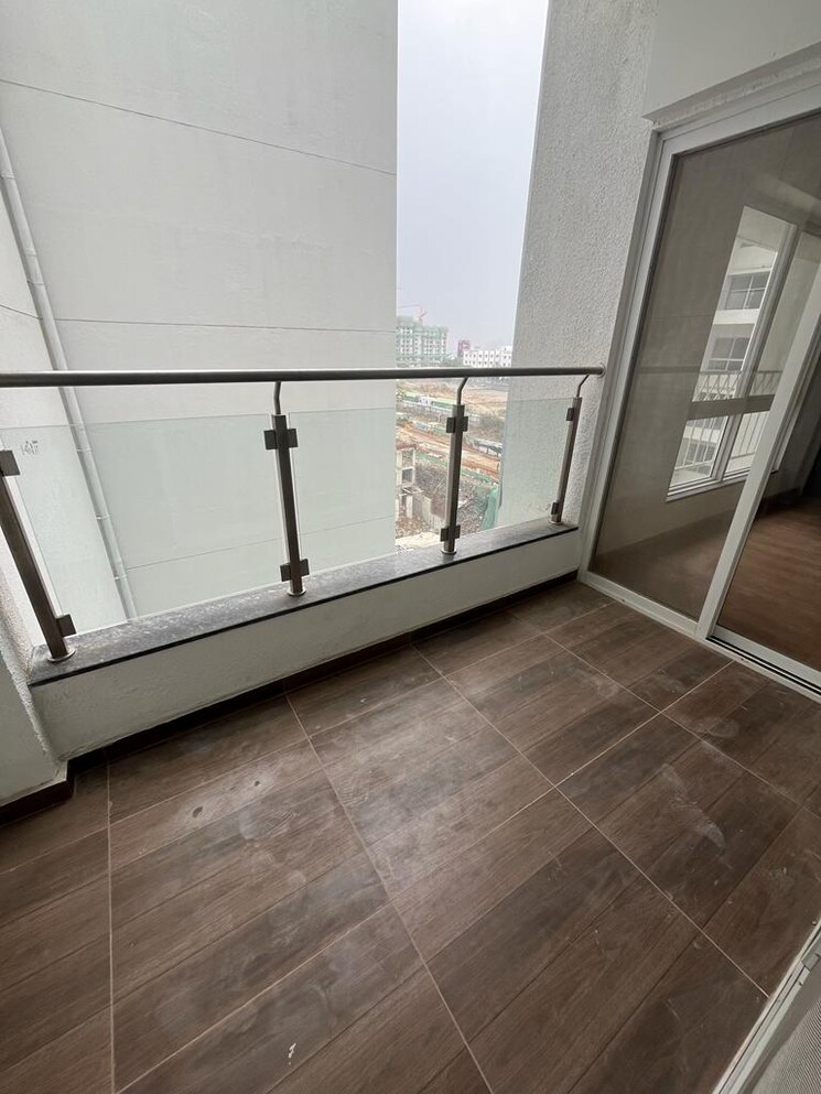 Balcony, gera-world-of-joy 2.5 Bedroom 920 Sq.Ft. Apartment In Kharadi Pune 9120559