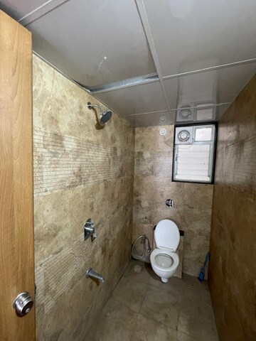 Bathroom in 2 BHK Apartment at Unique Youtopia, Kharadi – for Rent
