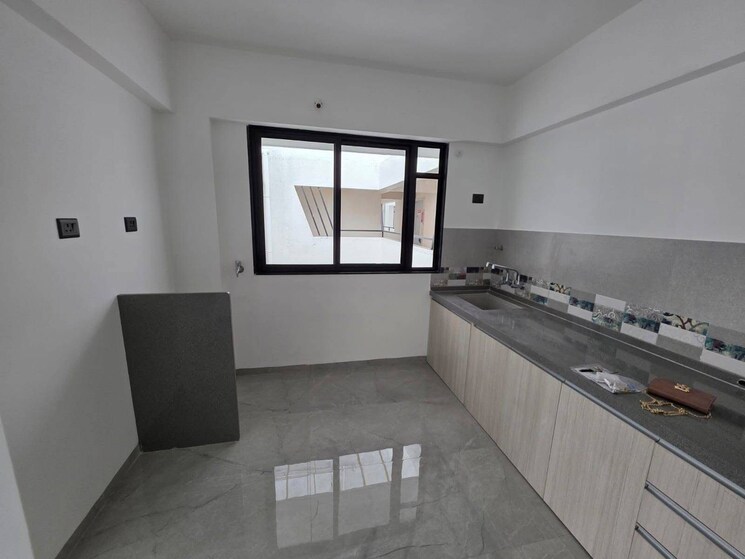 Kitchen, unique-youtopia 2 Bedroom 850 Sq.Ft. Apartment In Kharadi Pune 9120710