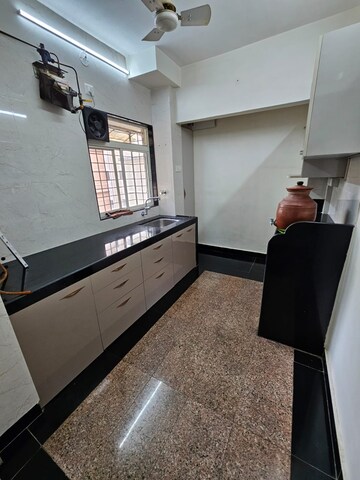 Kitchen in 2 BHK Apartment at Kanchan Pushp Society, Ghodbunder Road – for Rent