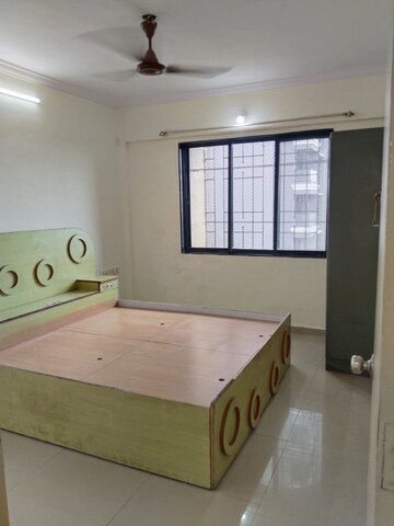Bedroom in 3 BHK Apartment at Jay Balaji CHS, Nerul Sector 6 – for Rent