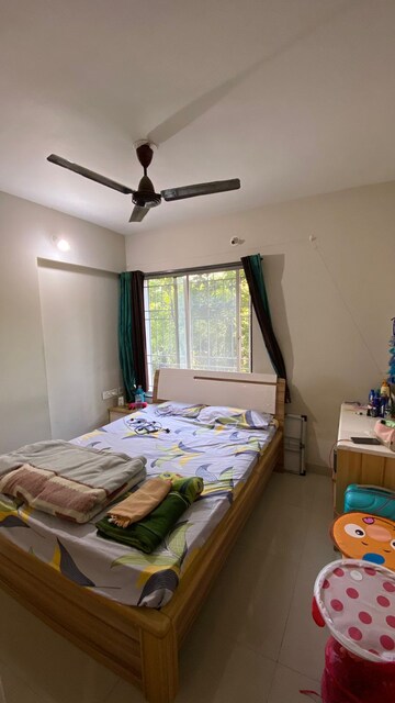 Bedroom in 2 BHK Apartment at Wadegaon – for Sale