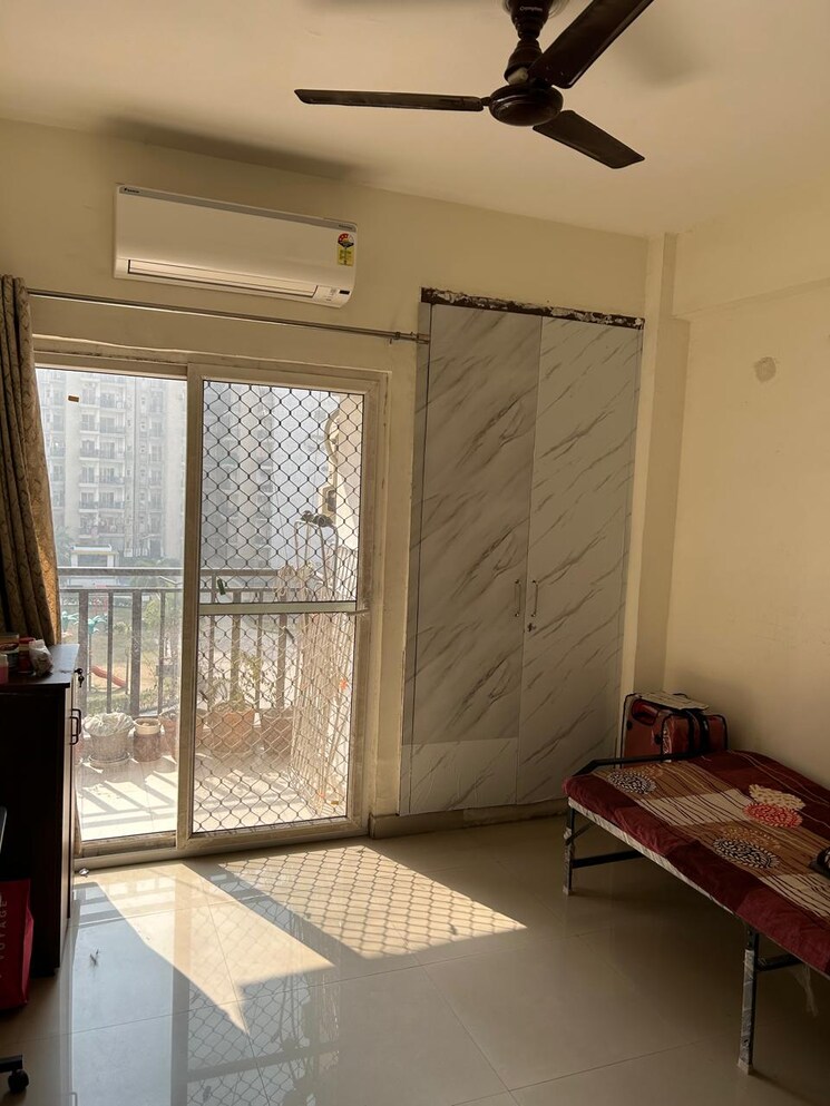 Bedroom, aims-golf-city 2.5 Bedroom 1035 Sq.Ft. Apartment In Sector 75 Noida 9121097