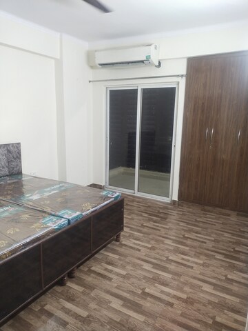 Bedroom in 2.5 BHK Apartment at Aims Golf City, Sector 75 – for Rent
