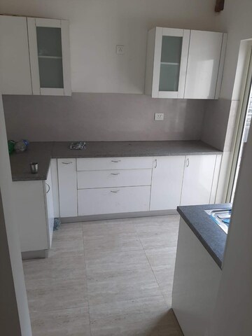 Kitchen in 3.5 BHK Builder Floor at Puri Aman Vilas, Sector 89 – for Sale