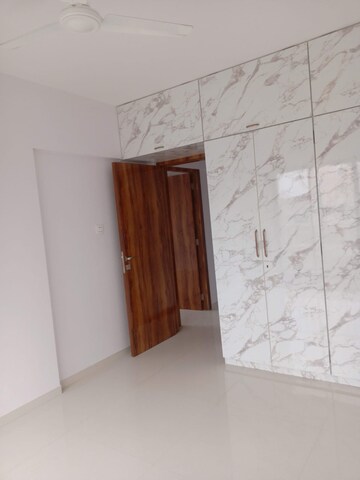 Room in 2 BHK Apartment at Oxford Navrang Crystal, Goregaon West – for Rent