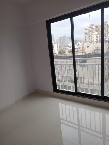 Room in 2 BHK Apartment at Oxford Navrang Crystal, Goregaon West – for Rent